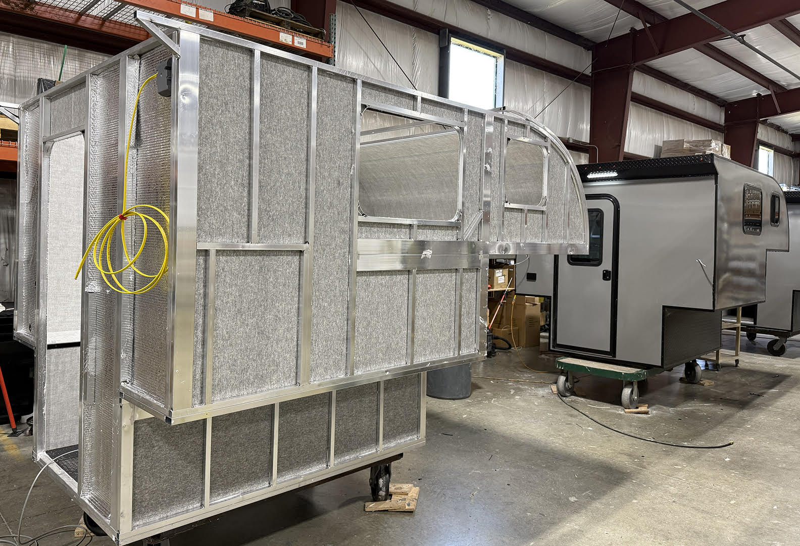 Welded aluminum camper frames in the manufacturing facility
